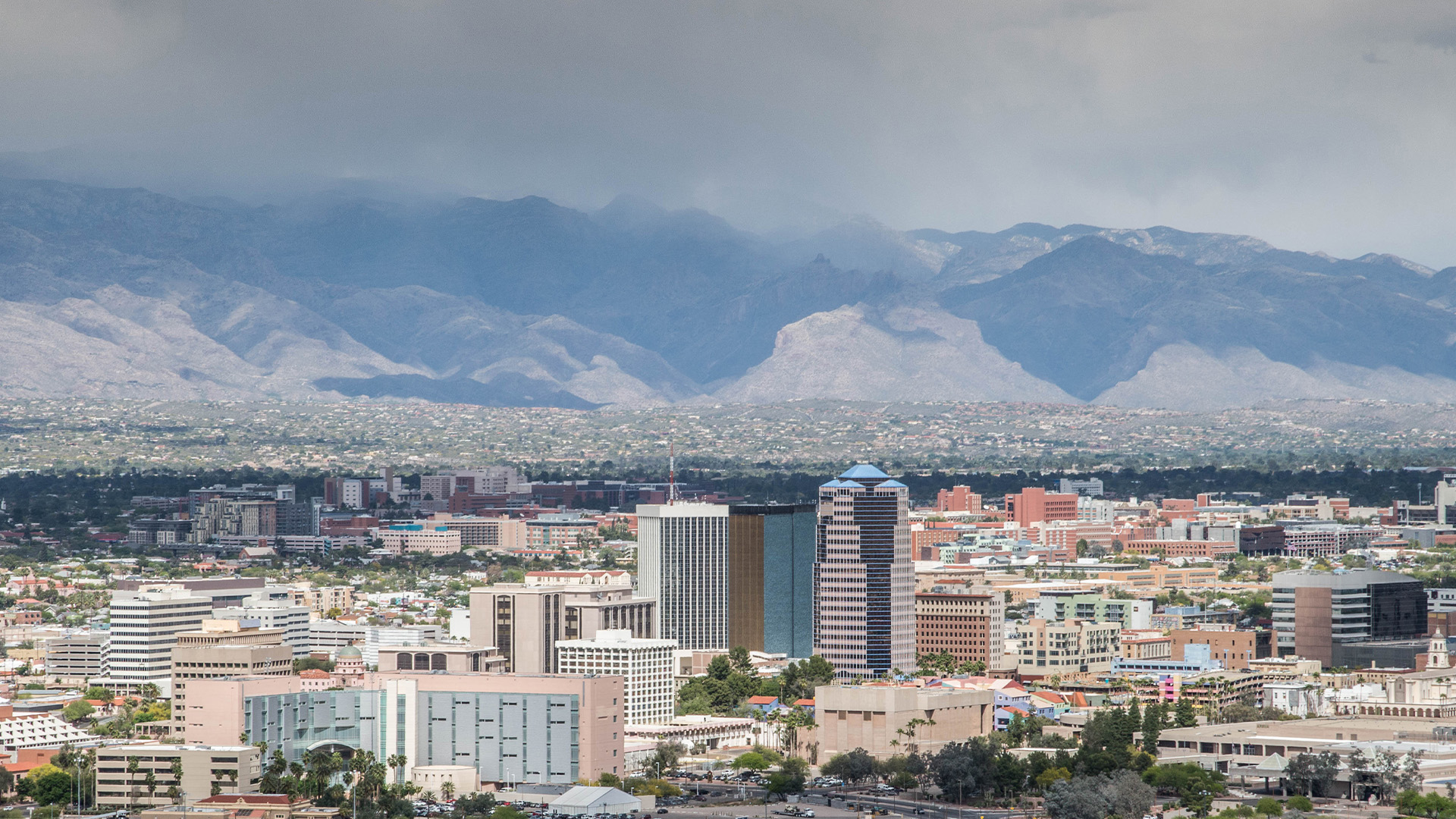 Aerial view of the city with mountains in the background